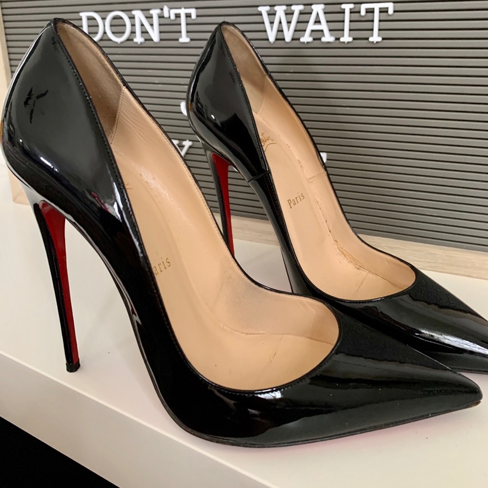 Christian Louboutin red bottom pumps